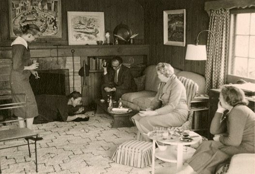 Doris McCarthy entertaining friends in her living room at Fool’s Paradise