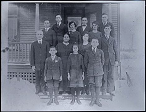 The family of Napoléon Demers, who settled in Welland in 1919, in front of their home, c. 1920