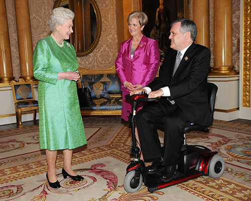 David Onley, as Ontario Lieutenant Governor, meeting Her Majesty the Queen at Buckingham Palace