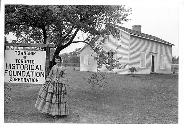 Mrs. Archer, a volunteer at The Bradley Museum in Mississauga