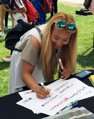 Filling out a “MyOntario is” form at Toronto’s Fort York on National Aboriginal Day