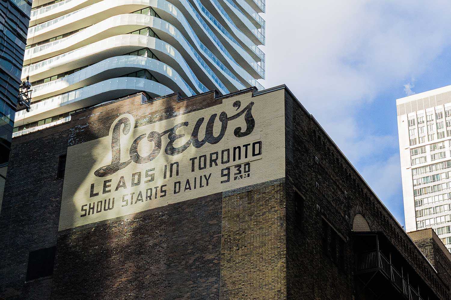 The sign from Victoria Street looking north from Queen Street. In 1913, the Loew’s theatre complex was built as the Canadian flagship theatre for a chain of vaudeville theatres, which were based in New York City and owned by Marcus Loew.