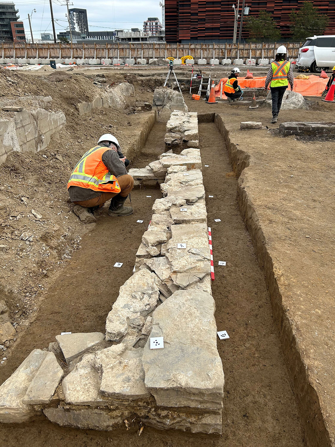 Once the foundation wall was fully exposed, archaeologists took many photographs to document the wall