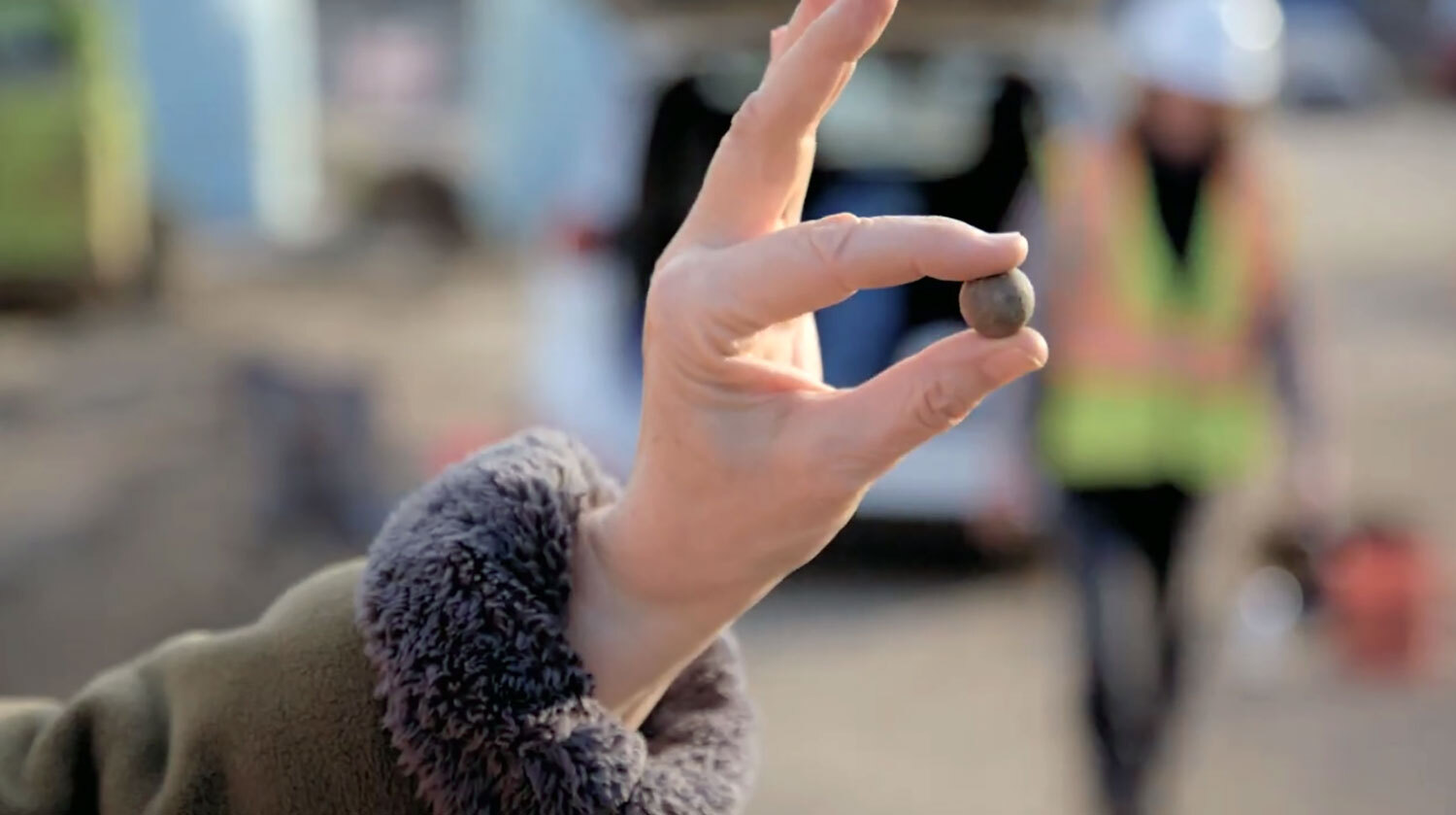 Archaeologists Eva MacDonald and Ron Williamson discuss musket balls found in 2023