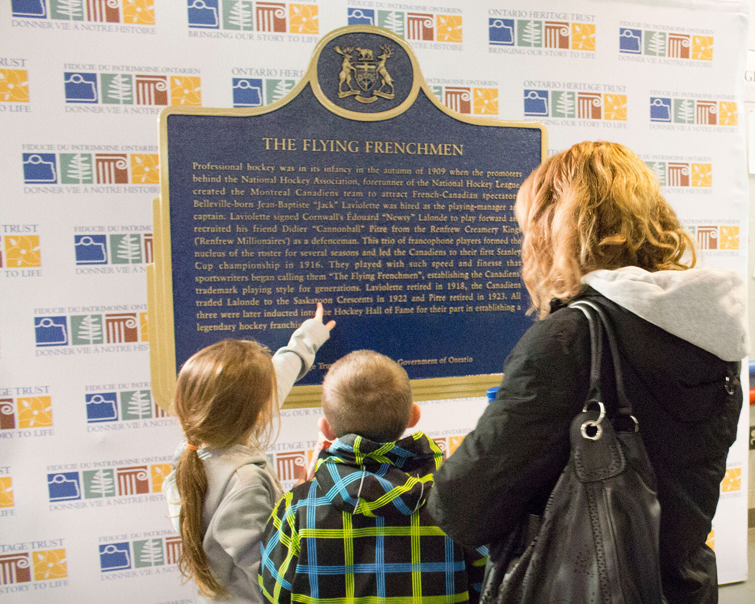 Provincial plaque commemorating The Flying Frenchmen